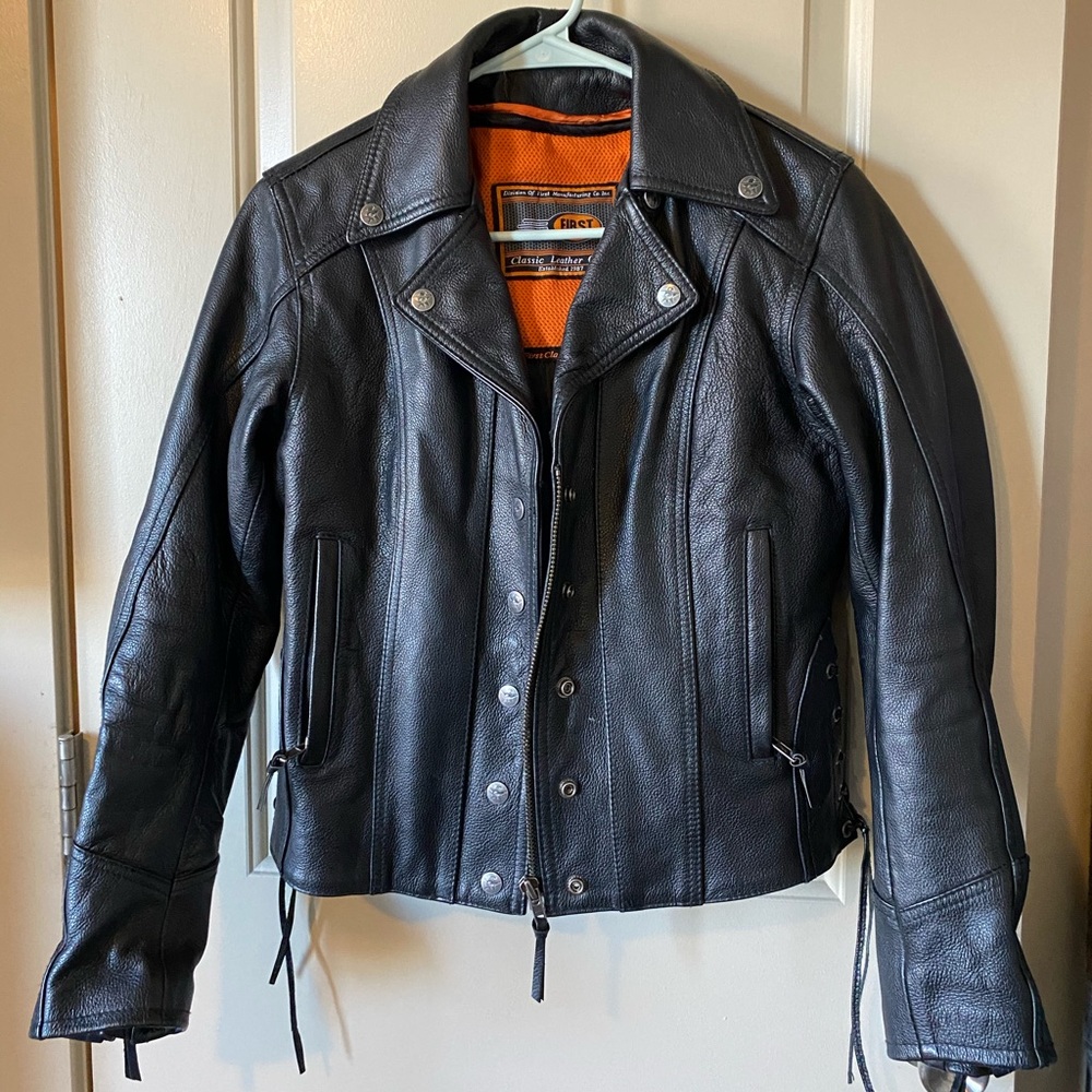 Women’s black leather motorcycle riding jacket